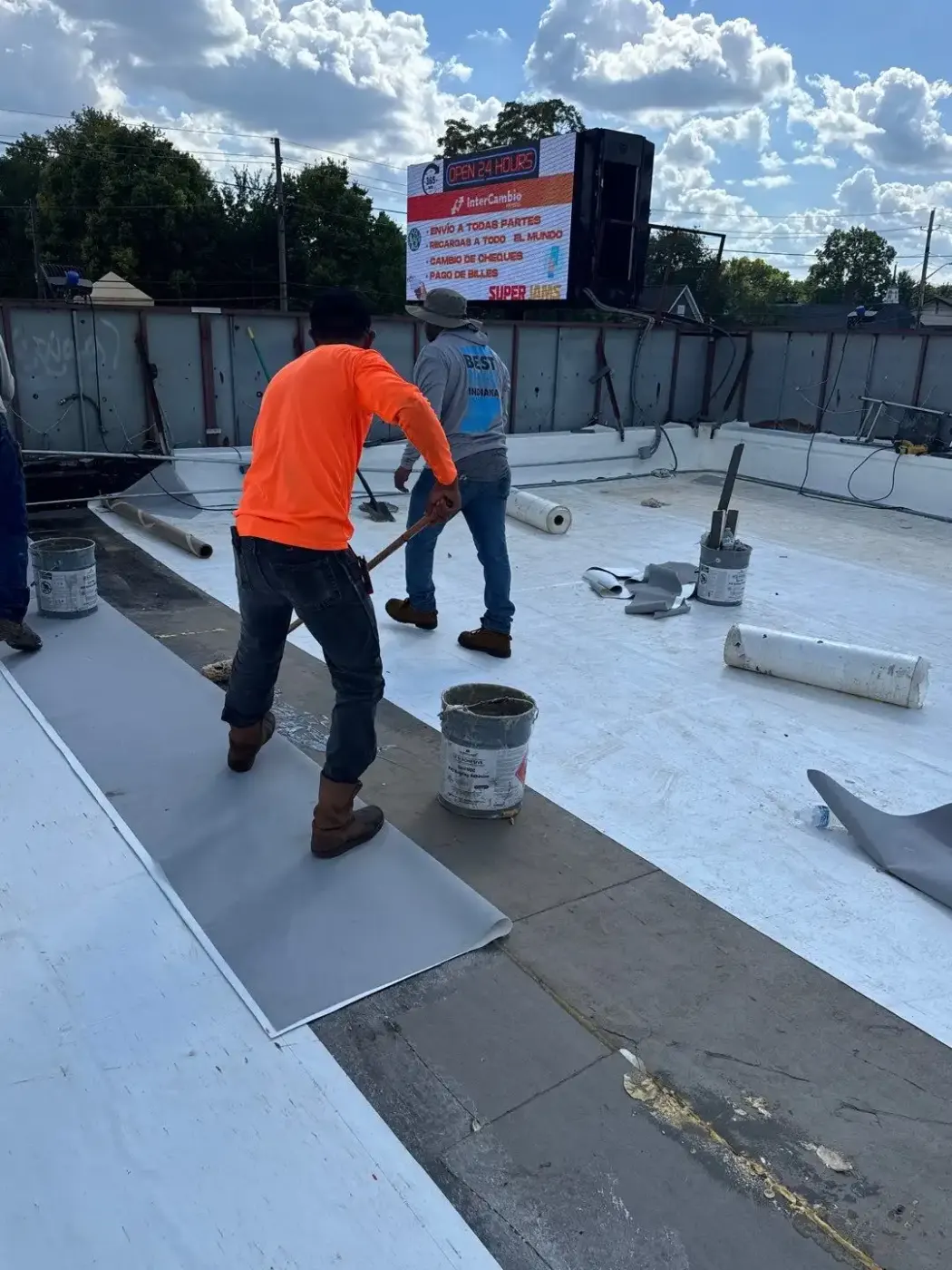 Tarping and dry-in on a Park 100 commercial roof